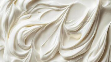Abstract swirls of a creamy, smooth substance creating a visually appealing texture, perfect for food or cosmetic product presentation. photo
