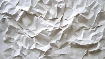 Dramatic and abstract view featuring crumpled paper with multiple layers. This composition showcases texture and contrast created by light. photo