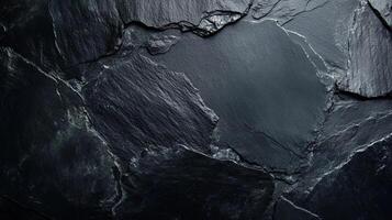 Dramatic interplay of shadow and light across a jagged slate surface, showcasing depth and texture. Dark, natural stone aesthetic. photo