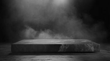 Elevated dark stone platform in a misty scene, for showcase or display, creating a striking contrast with the hazy background. photo