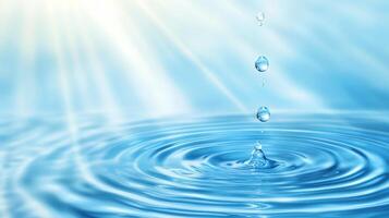 Captivating image of water droplets falling into a calm pool, creating concentric ripples. The blue tones evoke serenity and purity. photo
