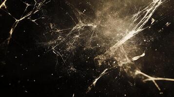 Intricate spiderweb against a dark background, illuminated by specks of light. A delicate yet strong natural creation. photo