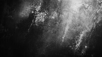 Dark textured surface with subtle light and contrasting patches creates depth and visual interest, making a captivating abstract backdrop. photo