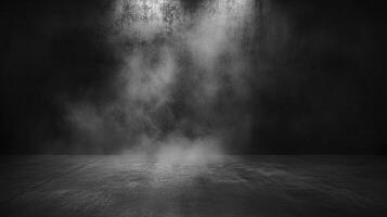 A stark, dramatic, black and white scene with fog rolling onto a textured floor. A spotlight highlights the mist against a dark background. photo