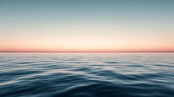 This beautiful ocean scene captures gentle waves under a soft pastel sunset, representing calmness and reflection, inviting viewers to immerse themselves in its serenity. photo