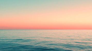 A breathtaking seascape showcasing a calm ocean at dusk, where the vibrant colors of the sky blend seamlessly with tranquil waters, evoking a sense of peace and serenity. photo