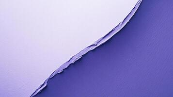 This abstract image displays a creative split texture of purple paint on a canvas, illustrating artistic flair and modern design elements with vibrant colors and contrasts. photo