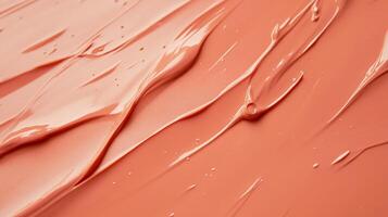 This image showcases coral paint spread uniformly to create captivating abstract patterns, demonstrating the dynamic movement and play of color and texture. photo