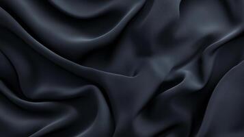 A dark satin fabric undulates in elegant waves, creating a rich and dynamic visual, ideal for backgrounds, fashion presentations, and sophisticated design contexts. photo