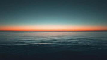 A tranquil seascape at sunset, showcasing a serene horizon where the calming waves reflect the pastel colors of the sky, inviting peace and contemplation. photo