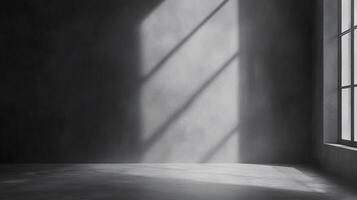 Minimalist room with gray walls and sunlight streaming through window casting shadows. Modern, empty interior for artistic expression. photo
