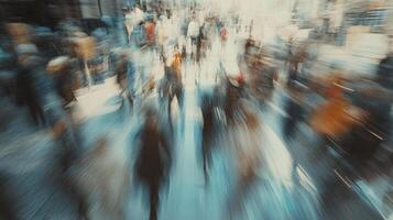 Abstract image of pedestrians walking on a city street, created with a motion blur effect. Captures the energy and fast pace of urban life. photo