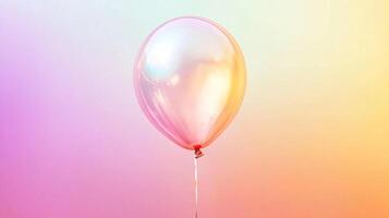A softly lit transparent balloon floats against a gradient background, creating a dreamy and festive atmosphere with subtle color shifts. photo