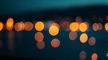 Abstract golden lights creating a magical cityscape glow against a dark twilight backdrop, embodying serene urban nights and calming ambiance. photo
