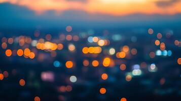 Blurred city lights at sunset create a warm, vibrant atmosphere in this abstract composition. The bokeh effect adds to the dreamy feel. photo