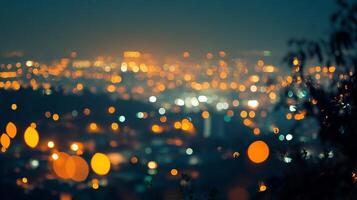 City lights blur in the distance, creating a bokeh effect. The dark sky complements the warm glow, hinting at urban nightlife. photo