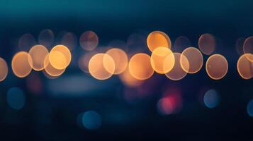 Abstract bokeh lights create a beautiful, blurred pattern with warm and cool tones. The circular shapes glow against a dark background. photo