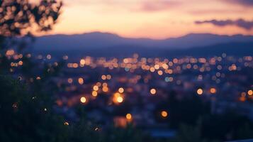City lights shine softly against a backdrop of dusky mountains and twilight hues, creating a serene, dreamy view from above. photo