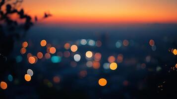 Blurred city lights twinkle against a vibrant sunset sky, creating a dreamy, atmospheric scene filled with warmth and tranquility. photo