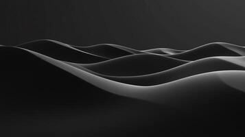 Abstract monochrome rendering of undulating dark dunes. The light plays softly on the dark and mysterious formations creating soft shadows. photo