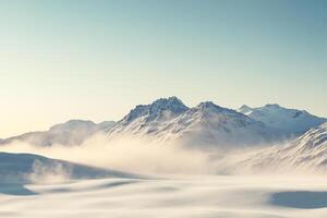 Serene snowy mountain range, the peaks covered in a blanket of white against the pale blue sky, a peaceful and majestic winter landscape. photo