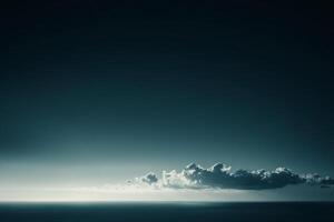 Serene seascape featuring a tranquil ocean under a vast sky, crowned with a line of fluffy clouds, bathed in soft, diffused light. photo