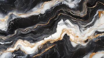 Intricate patterns of black, white, and gold create an elegant, swirling marble effect. Abstract art with fluid texture and rich colors. photo
