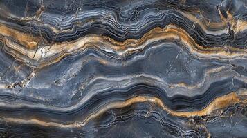 Abstract stone texture showcasing swirling layers of gray, gold, and white, creating a natural, organic and decorative pattern. photo