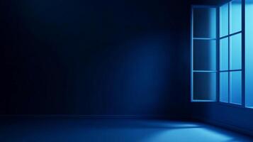 A dimly lit, empty room bathed in shades of blue. A window emits a soft, illuminating glow, creating a calm ambiance and quiet atmosphere. photo