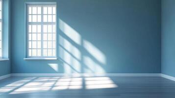 Sunlight streams through a window in a light blue room, casting patterned shadows across the wall and floor creating a serene atmosphere. photo