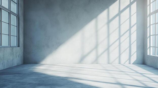 Sunlight streams into an empty room, creating geometric patterns on the floor and walls. Minimalist architectural scene with light and shadow. photo