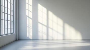 Sunlight streams into a minimalist room with large windows, casting shadows across the pristine floor and walls. A bright, modern interior. photo