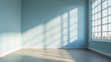 Sunlight streams into an empty blue room through a window, creating shadows and light patterns on the walls and floor. Serene simplicity. photo