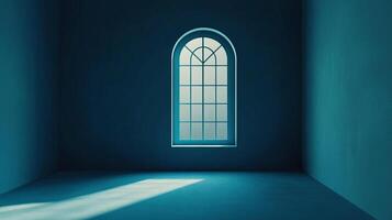 Illuminated window casting light in a dim, monochromatic room. The stark contrast highlights architectural details and creates a serene space. photo