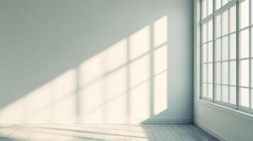 Light streams through a window, casting an geometric pattern on the wall, contrasting with the neutral background and light wood floors. photo