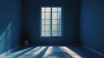 A room bathed in blue hues, illuminated by sunlight streaming through a gridded window, casting shadows on the floor. Minimalistic setting. photo