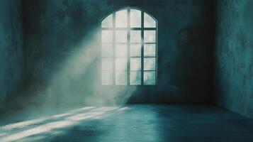 Light streams through a frosted window into an empty blue room creating a moody, atmospheric ambiance. Rays cut across dust. photo