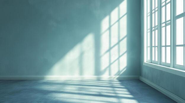 Sunlight streams into a spacious room through a multi-pane window, casting geometric patterns on the wall and floor, inviting warmth and serenity. photo
