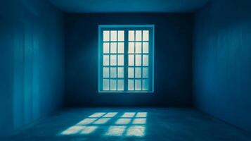 Monochromatic room with window as the primary light source, casting geometrical patterns on the floor in shades of blue and gray. photo