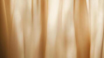 An abstract image of flowing beige fabric, with smooth lines and soft gradients creating a sense of gentle movement and subtle depth. photo