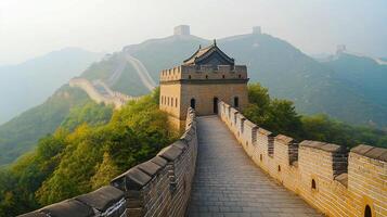 Ancient defensive architecture snaking through lush, green mountains. Historical landmark offering views and insight into the past. photo