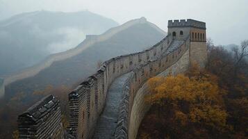 Extensive fortification, showcasing imposing architectural marvel, winding through a foggy landscape. A symbol of strength, unity, and cultural heritage. photo