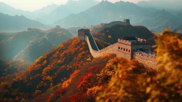 Elevated view of historical fortification on a mountain range, with golden foliage and misty backdrop. A tranquil scenery. photo