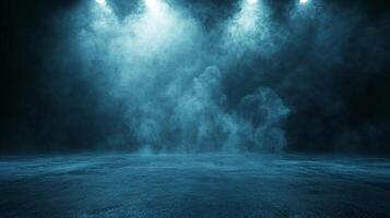 Blue field with smoke in the background. The smoke is coming from a light show. Scene is mysterious and dramatic photo