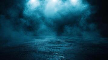 Dark blue sky with smoke and light shining on it. Scene is mysterious and ominous photo