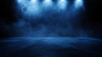 Blue field with a blue sky and a blue light in the background. The sky is filled with smoke and the light is shining on the field photo