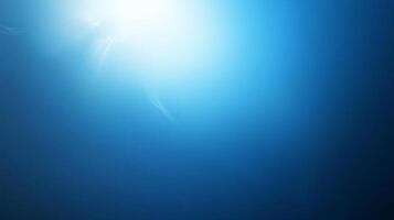 Abstract blue gradient background with soft lighting. Creates a serene and calming visual, perfect for desktop or mobile backgrounds. photo