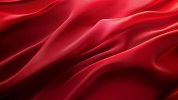 Elegant folds of deep red fabric create a luxurious and flowing texture, evoking a sense of passion, richness, and sophisticated design. photo