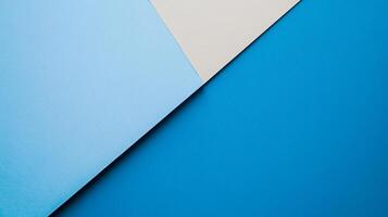 Abstract arrangement of paper in light blue, grey, and dark blue creates a modern and geometric visual texture, suitable for various designs. photo