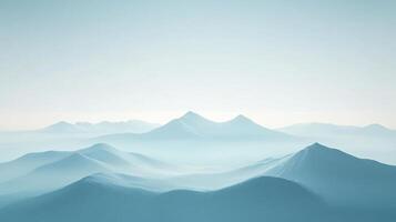 Misty mountain range in pastel blue hues. Serene landscape, layers of peaks diminishing into a soft horizon. A peaceful natural vista. photo